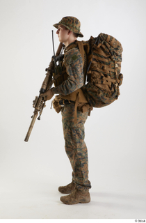 Photos Casey Schneider Paratrooper with gun holding gun standing whole…